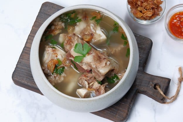 Soup Bones simmering in a pot to unlock their rich flavor and nutrition.