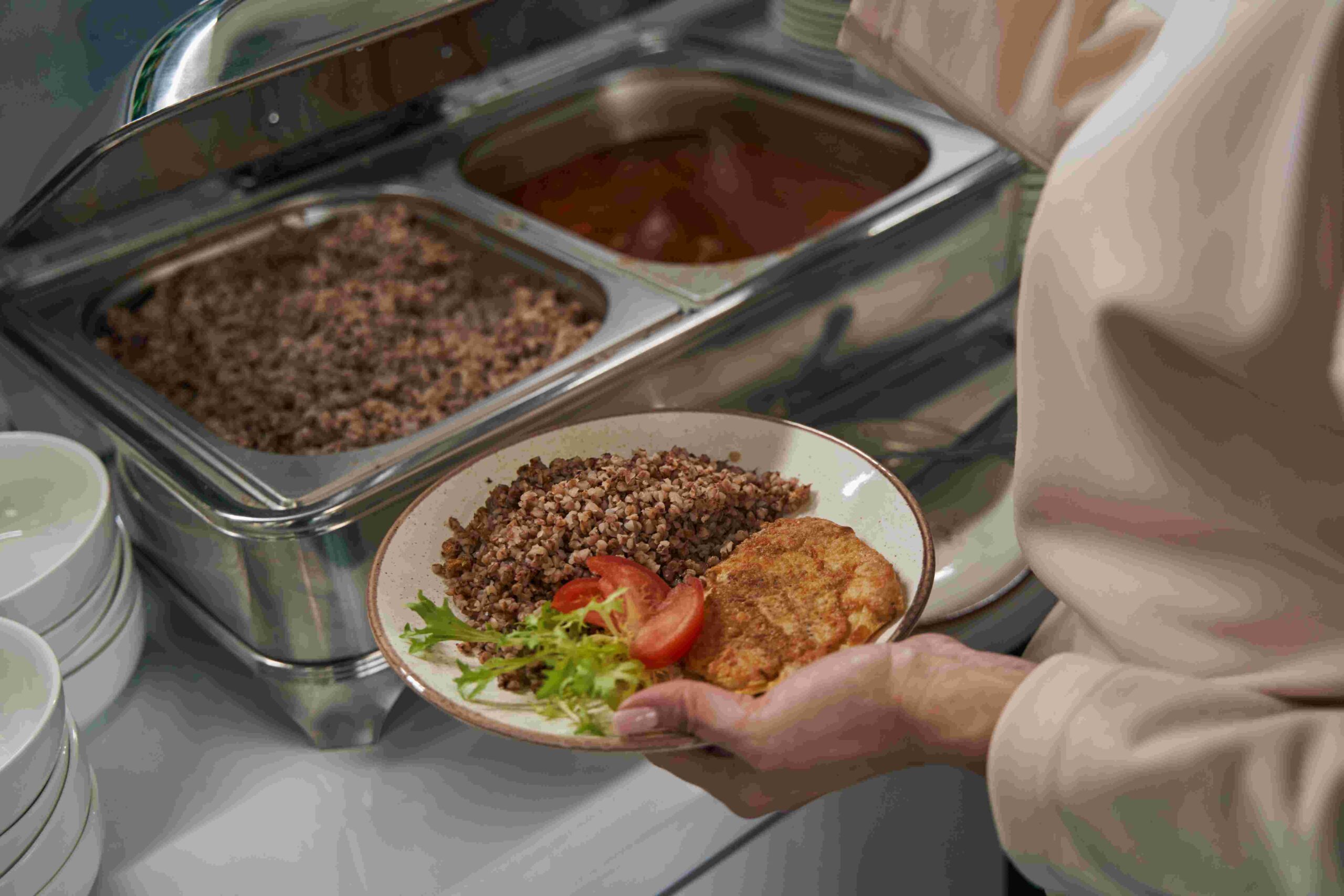 A beautifully set table featuring a variety of serving dishes, perfect for enhancing food presentation.