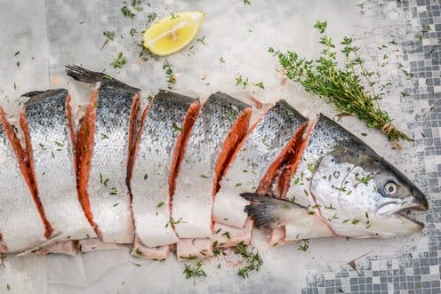 Grilled Salmon Kama served with lemon and soy sauce