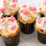 A collection of unicorns and cupcakes with vibrant colors and whimsical designs.